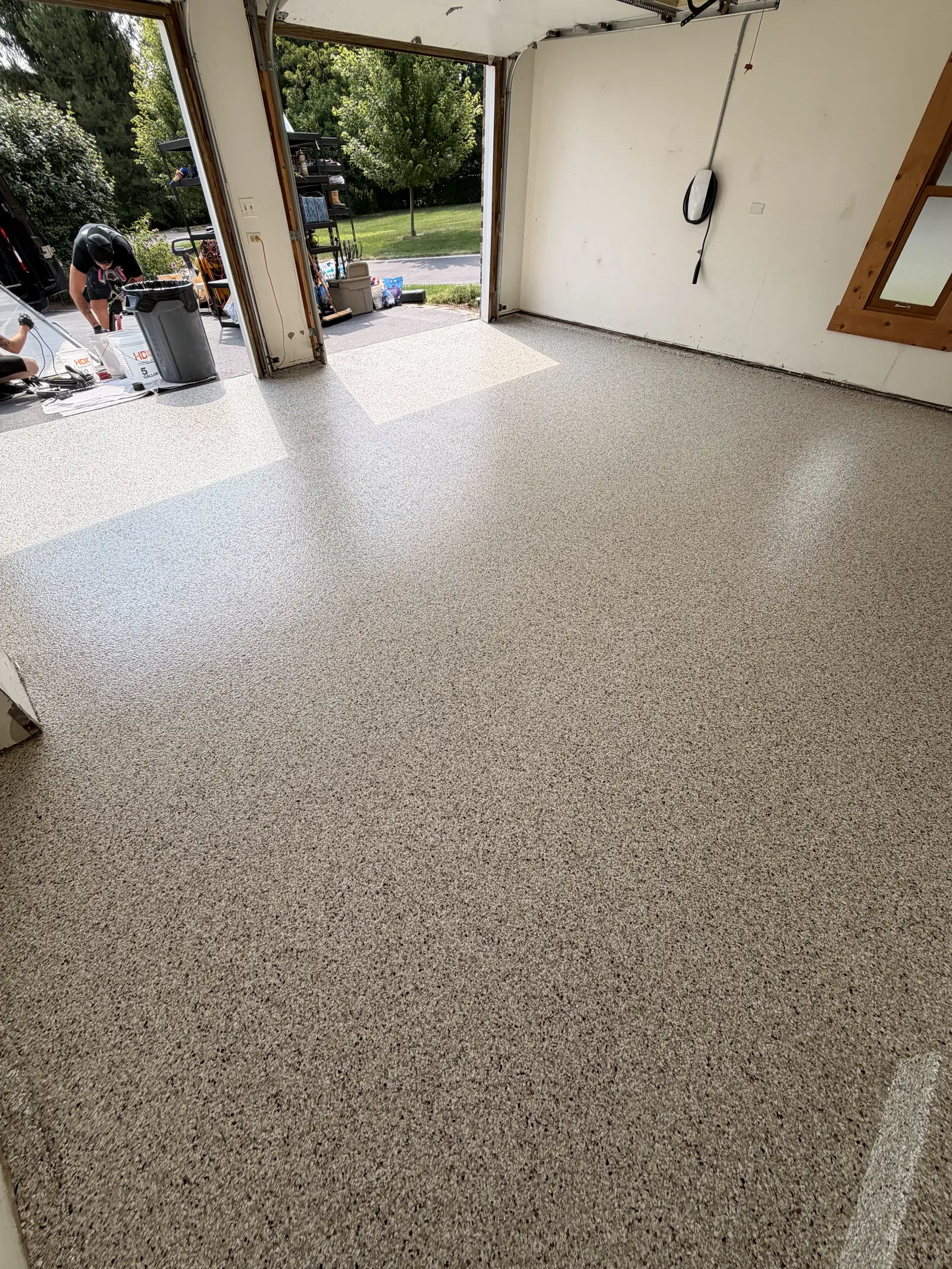 Sand coloured quartz floor in a finished garage